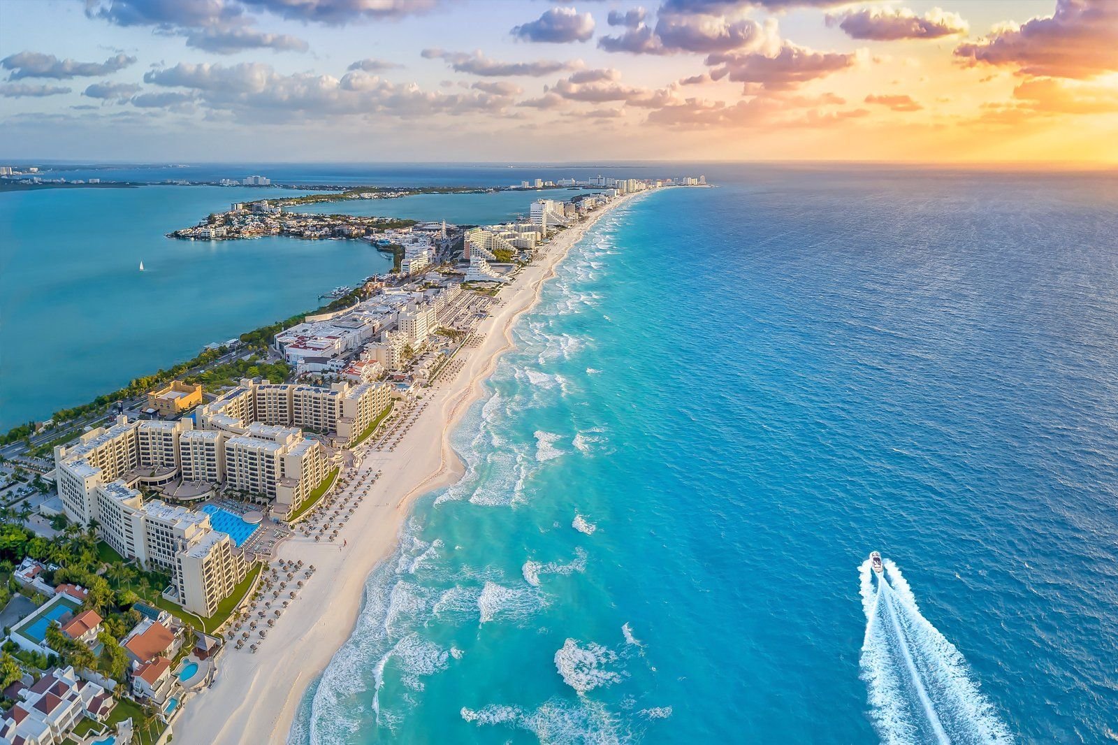 Aerial view of Cancun's Hotel Zone peninsula between the lagoon and the Caribbean Sea